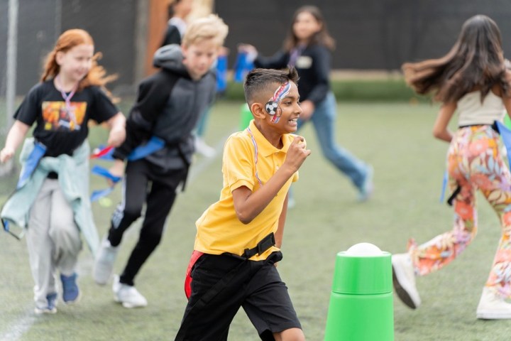 a group of people playing with a ball
